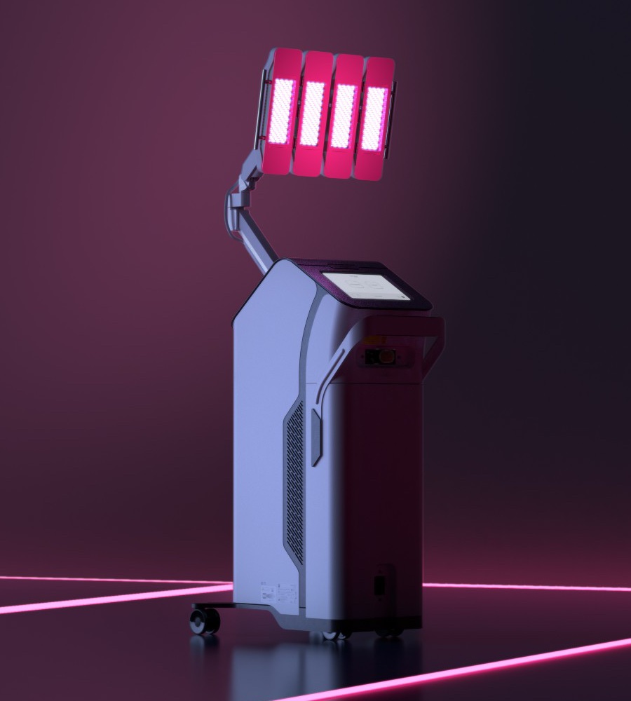 The Dermalux Tri-Wave MD LED system with its four panels glowing, on an adjustable arm